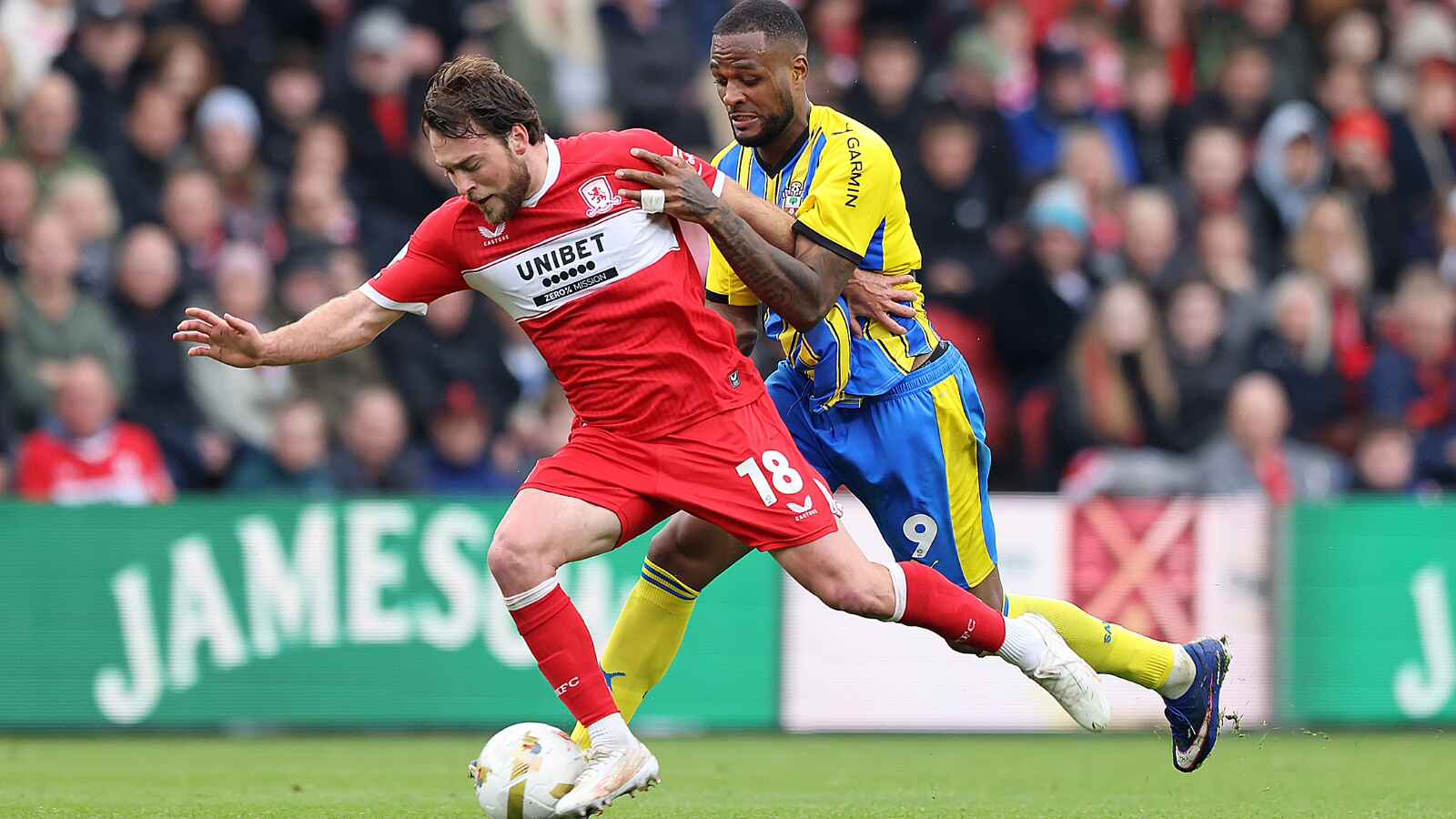 Middlesbrough’s Aidan Morris (left) and Southampton’s Cyle Larin battle for the ball