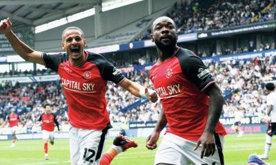 Shayden Morris celebrates making it 3-2 to Luton Town