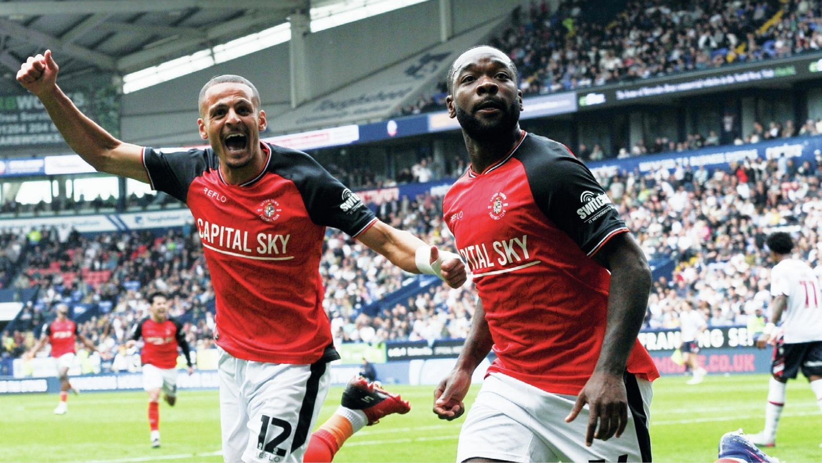 Shayden Morris celebrates making it 3-2 to Luton Town