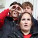 A Middlesbrough fan makes a binoculars gesture during the Championship play-off match against Southampton