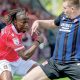 Wrexham’s Issa Kabore, left, is challenged by Middlesbrough’s Matt Targett