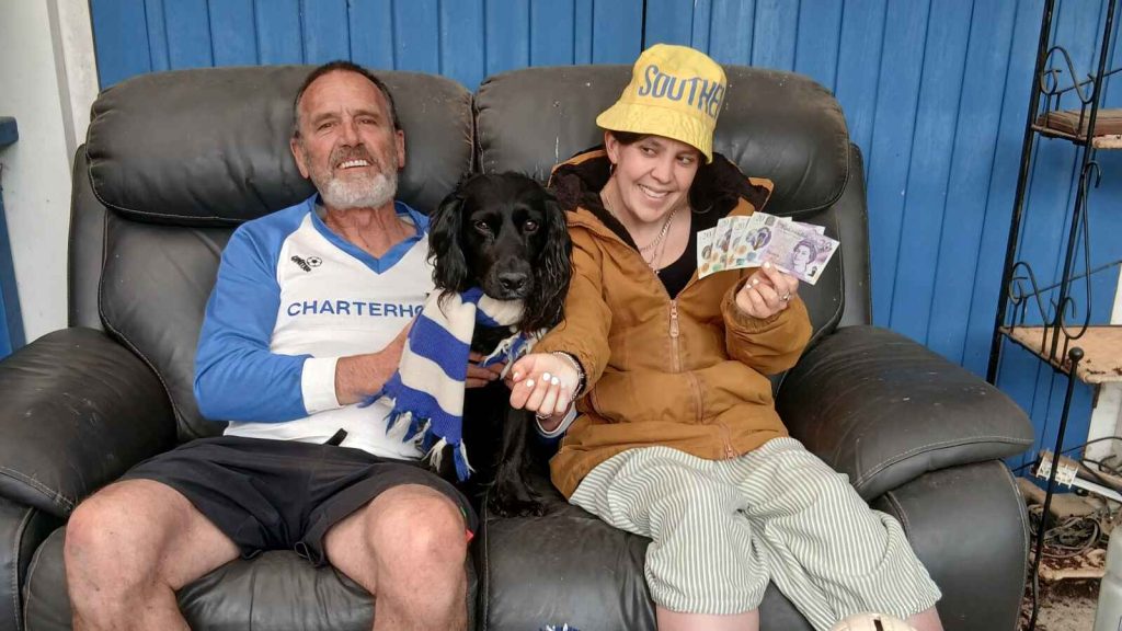 Mick and Livy Seal, plus Shrimp the Dog, celebrate their Fantasy success