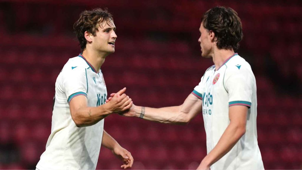 Aaron Pressley, left, celebrates scoring Walsall’s winner