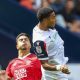 Bolton Wanderers’ Akin Famewo heads clear under pressure