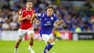 Cian Ashford of Cardiff City in action against Wrexham