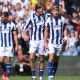 West Bromwich Albion’s Isaac Price (centre) celebrates after dispatching his penalty.