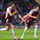 Exeter City skipper Jack Fitzwater, left, enjoys his early goal