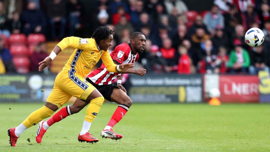 AFC Wimbledon star forward Junior Nkeng is the subject of transfer speculation.