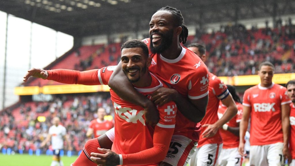 Charlton Athletic’s Karlan Grant celebrates after scoring with Nathaniel Chalobah