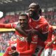 Charlton Athletic’s Karlan Grant celebrates after scoring with Nathaniel Chalobah