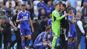 Leicester City players react after being relegated from the Premier League in 2023