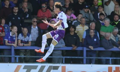 Crawley Town’s Louie Watson celebrates scoring the winning penalty