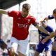 Ollie Pearce, left, in action for York City in last season’s title decider at Rochdale.