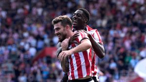 Southampton’s Ryan Manning celebrates scoring the clincher from the spot