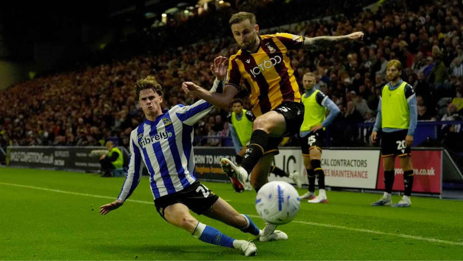 Sheffield Wednesday’s Harry Gray, left, and Bradford City’s Macaulay Gillesphey