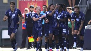 Millwall’s Tairyk Arconte, centre, celebrates his second goal with his teammates