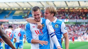 Blackburn Rovers skipper Todd Cantwell celebrates his goal with Andri Gudjohnsen, right