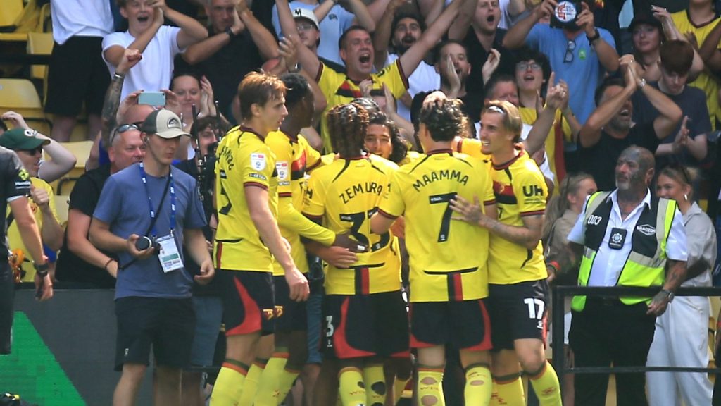 Watford’s Amin Nabizada (centre, facing) celebrates scoring the second goal.