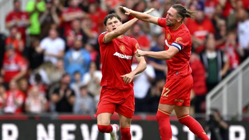 Middlesbrough’s Will Lankshear, left, celebrates scoring with skipper Luke Ayling