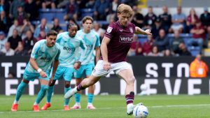 Burnley’s Zian Flemming keeps his composure from the penalty spot against West Ham United.