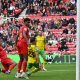 Ashley Phillips, left, scores Middlesbrough’s late winner against Norwich City.