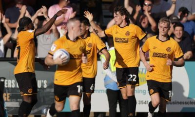 Cambridge United’s Zak Bradshaw, second right, is congratulated on his late leveller.