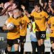 Cambridge United’s Zak Bradshaw, second right, is congratulated on his late leveller.
