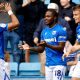 Gillingham’s Sheldon Kendall, centre, takes the congratulations.