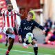 Swansea City’s Jay Fulton clears under pressure from Sorba Thomas in the opening day win at Stoke City.