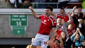 Wrexham’s Kieffer Moore celebrates scoring their first goal.