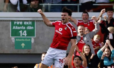 Wrexham’s Kieffer Moore celebrates scoring their first goal.