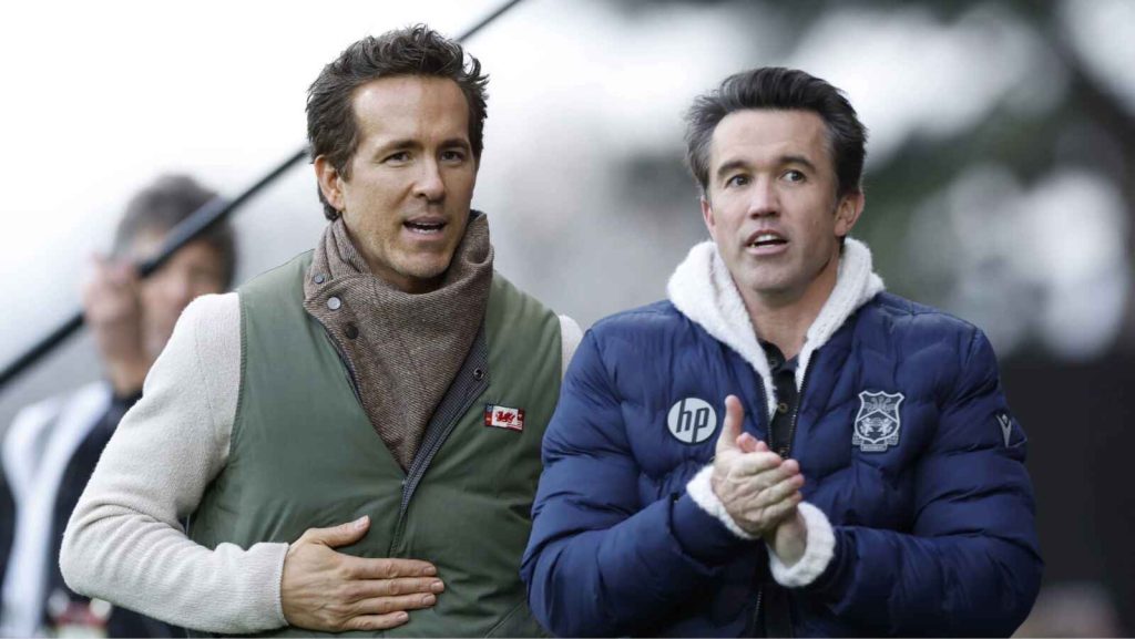 Wrexham co-owners Ryan Reynolds (left) and Rob Mac on the sidelines at the Racecourse Ground.