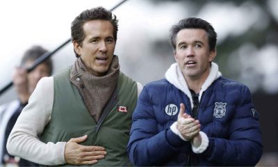 Wrexham co-owners Ryan Reynolds (left) and Rob Mac on the sidelines at the Racecourse Ground.