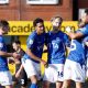Stockport County’s Kyle Wootton, right, celebrates with team-mates