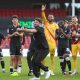 Swansea City and Vitor Matos celebrate their 2-1 victory over Lincoln City that sent them to the top of the Championship.