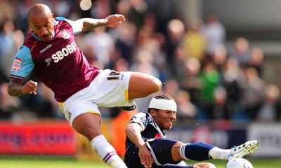 Millwall’s Tamika Mkandawire and West Ham United’s Julien Faubert battle for the ball at The Den in 2011