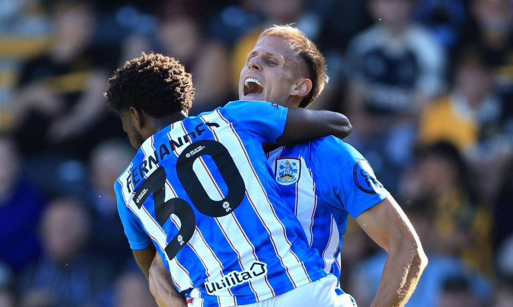 Huddersfield Town’s Derensili Sanches Fernandes takes the congratulations after scoring his opener.