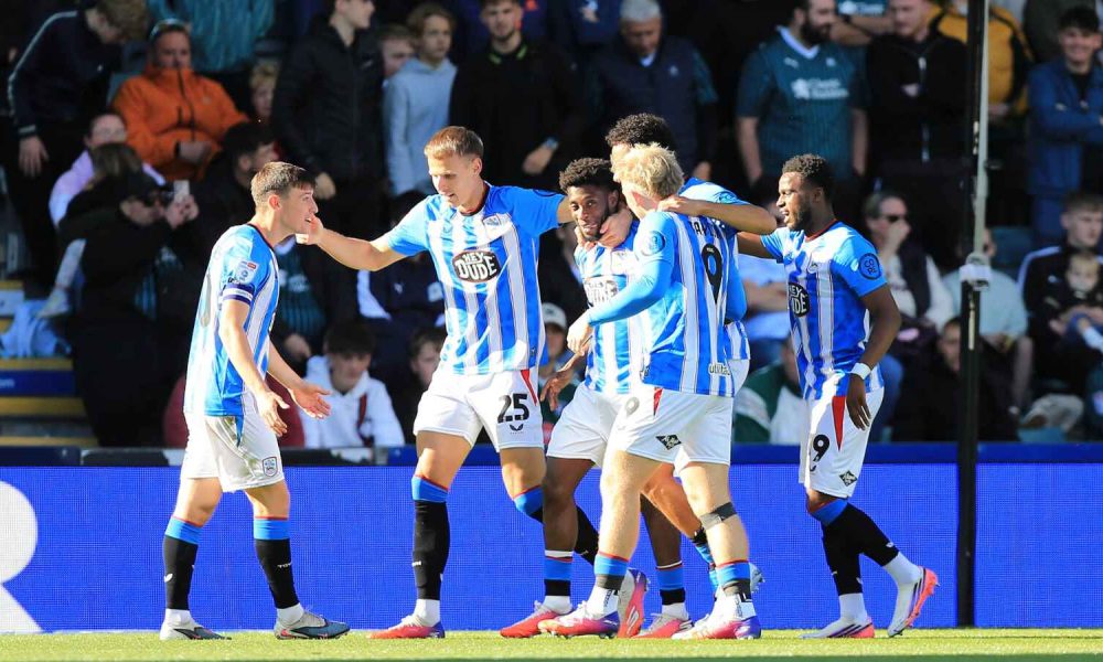 Huddersfield Town’s Derensili Sanches Fernandes is congratulated on the opener