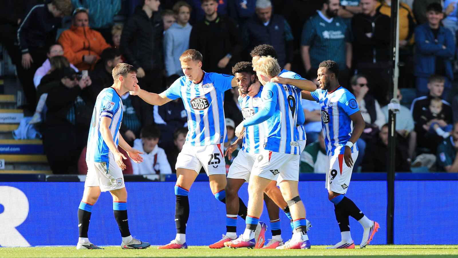Huddersfield Town’s Derensili Sanches Fernandes is congratulated on the opener