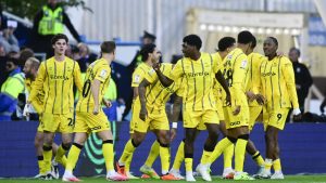 Sheffield Wednesday’s Jamal Lowe, right, celebrates his equaliser with his team-mates