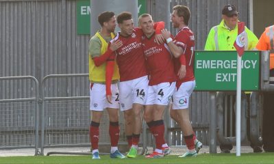 Jordan Gibson, second from left, celebrates his second goal for Crewe Alexandra.
