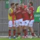 Jordan Gibson, second from left, celebrates his second goal for Crewe Alexandra.