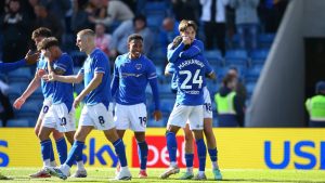 Louie Marsh celebrates with fellow Chesterfield goalscorer Dilan Markanday