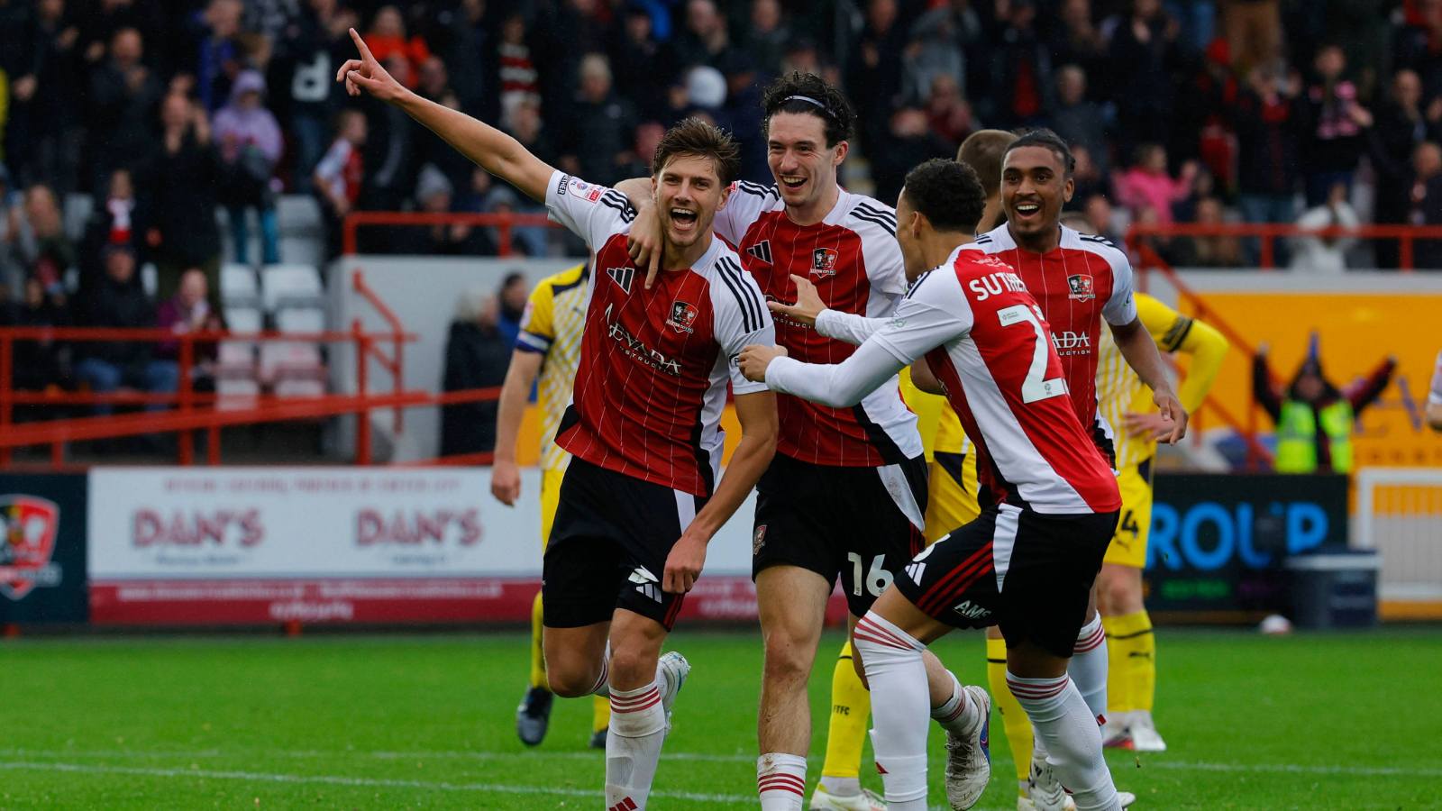 Luca Woodhouse savours his winner for Exeter City