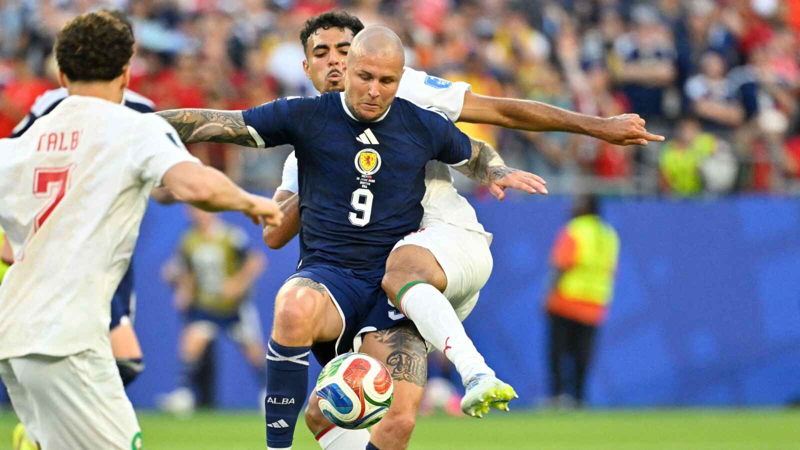 Lyndon Dykes on the ball for Scotland against Morocco in the World Cup.