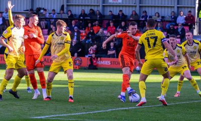 Salford City goalscorer Macaulay Langstaff is outnumbered