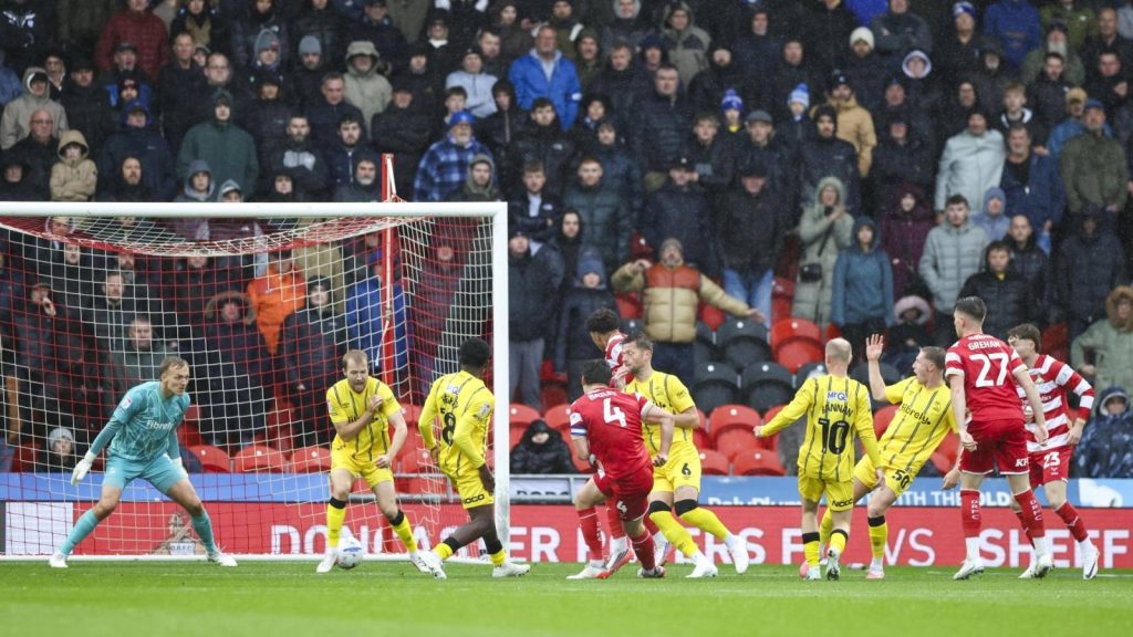Doncaster Rovers skipper Owen Bailey scores his first goal