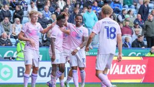 Peterborough United celebrate in their comfortable win at the King Power Stadium against Leicester City.
