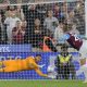 QPR keeper Pierce Charles plunges to his left to keep out Jarrod Bowen’s late spot-kick for West Ham.