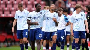 Plymouth Argyle goalscorer Bim Pepple, second from left, celebrates his opener with Bradley Ibrahim